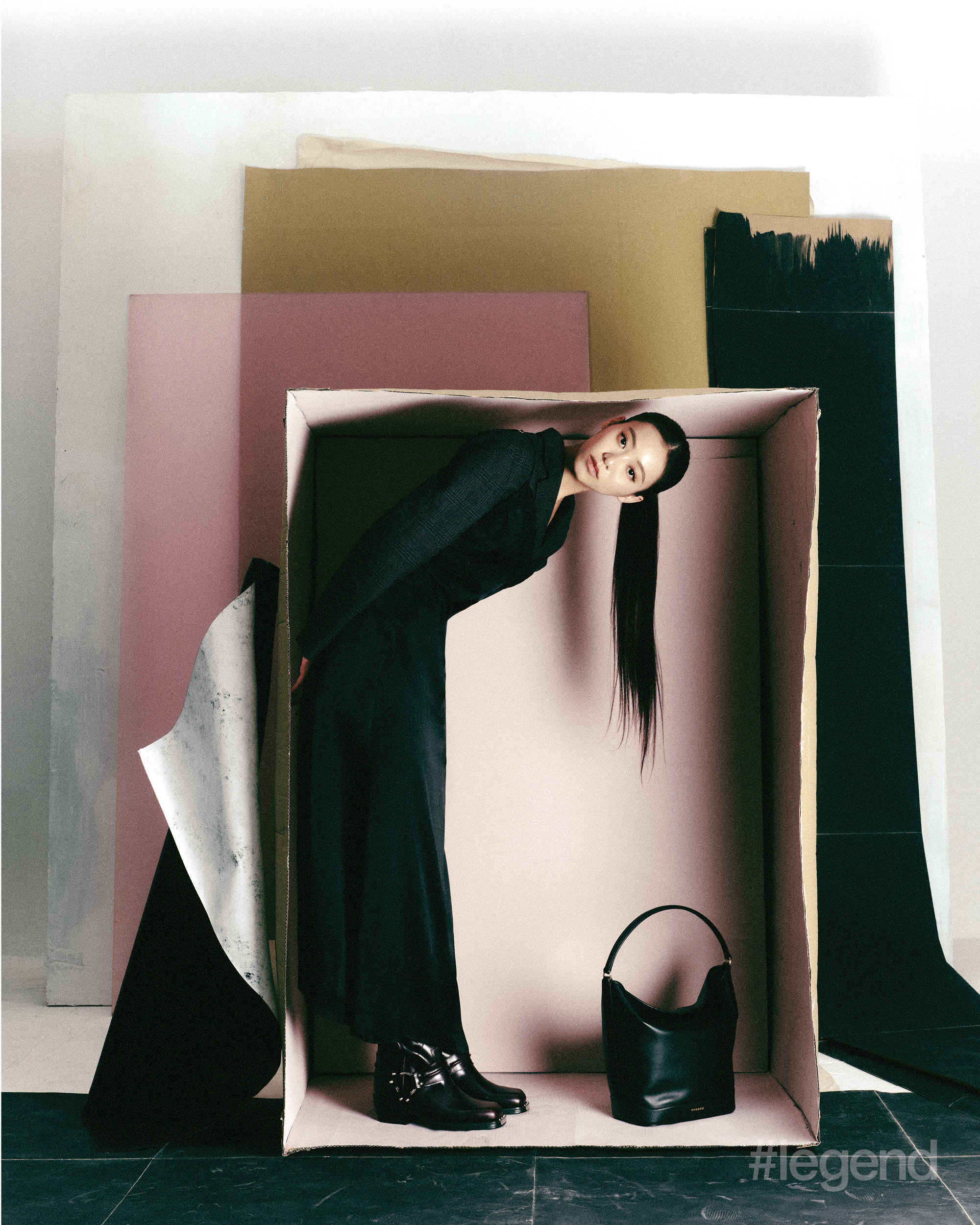Grey Prince of Wales check jacket, and black skirt, cowboy boots and Tangoso bag _ Sandro