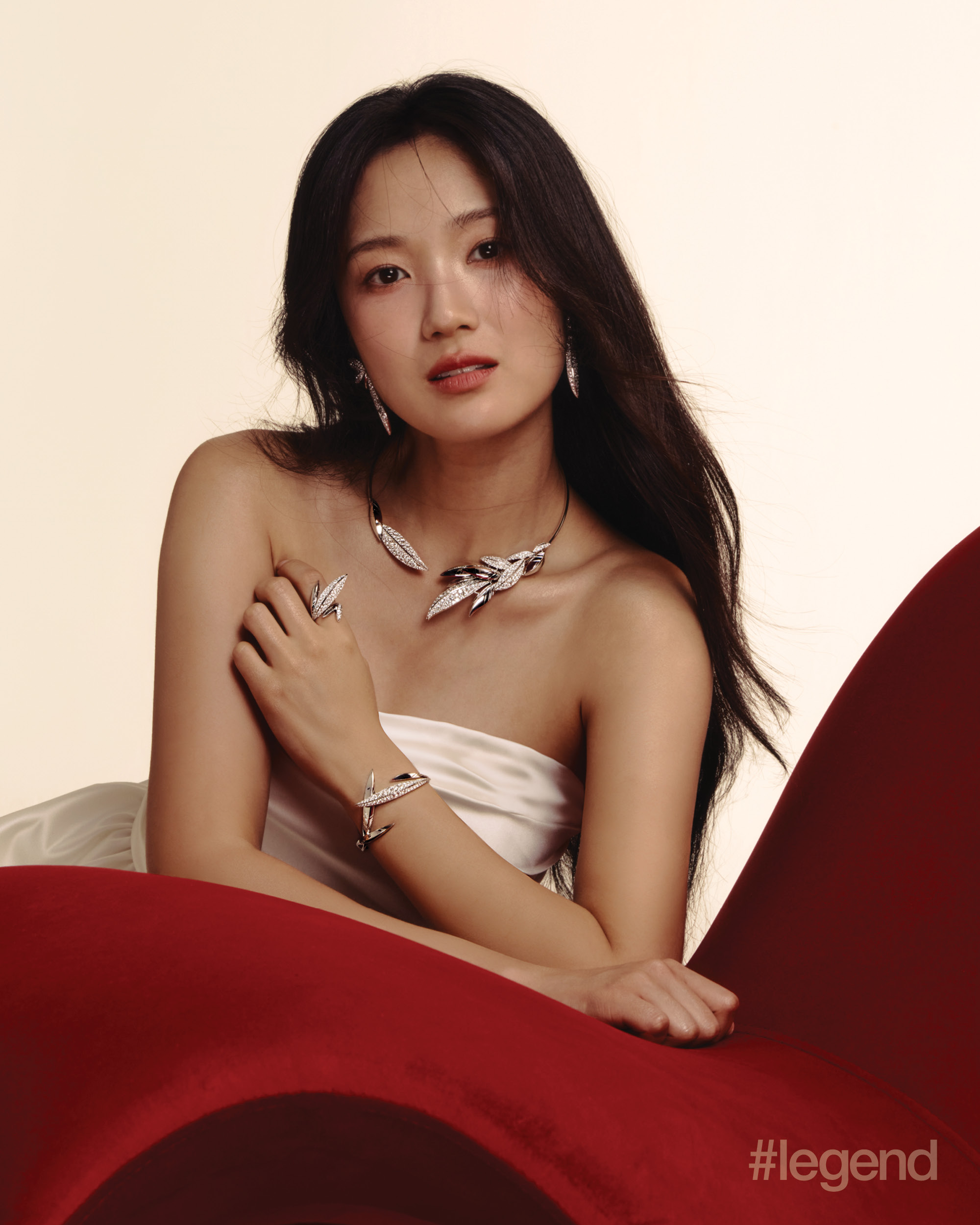 White strapless gown _ The Wedding Gown; Bond Collection earrings, necklace, bangle and ring in 18k white gold with diamonds _ Chow Tai Fook