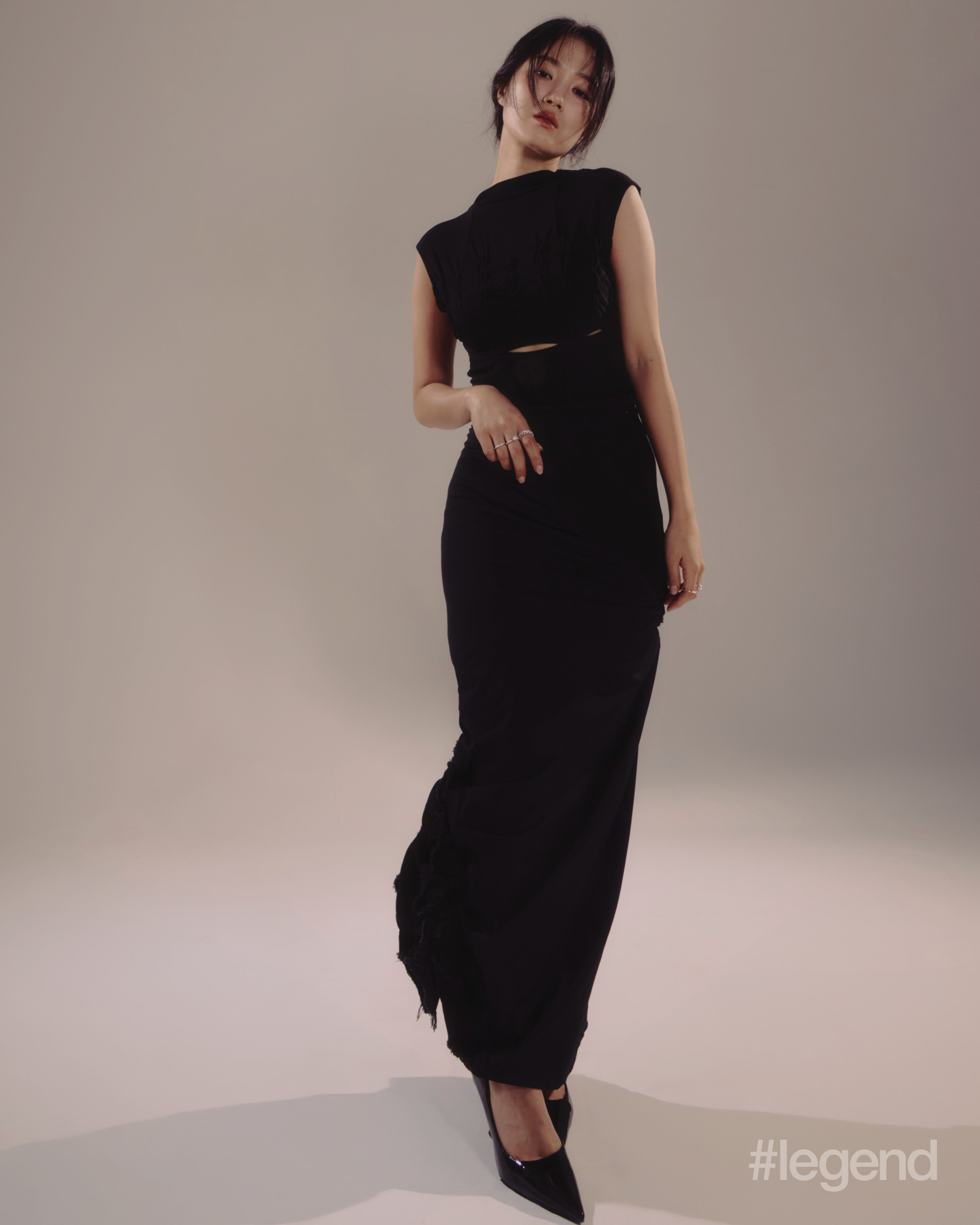 Black sleeveless dress _ Ponder.er; Bond Collection 2-prong Bond Rings in 18k white gold, and rings in 18k white gold with diamonds _ Chow Tai Fook