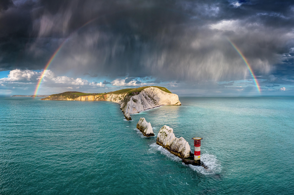 Main Title Third Place goes to Jamie Russell of Isle of Wight, UK, who took advantage of sea and air to capture the photo ‘Evening Shower Over the Needles’. Jamie reports, “Some large showers started developing 20 miles or so to our north-northwest. Realising they could cross The Needles with rainbow potential, we jumped in our rib at Colwell Bay and positioned ourselves with the camera.” This photograph also came second in the vote for the Public Favourite.