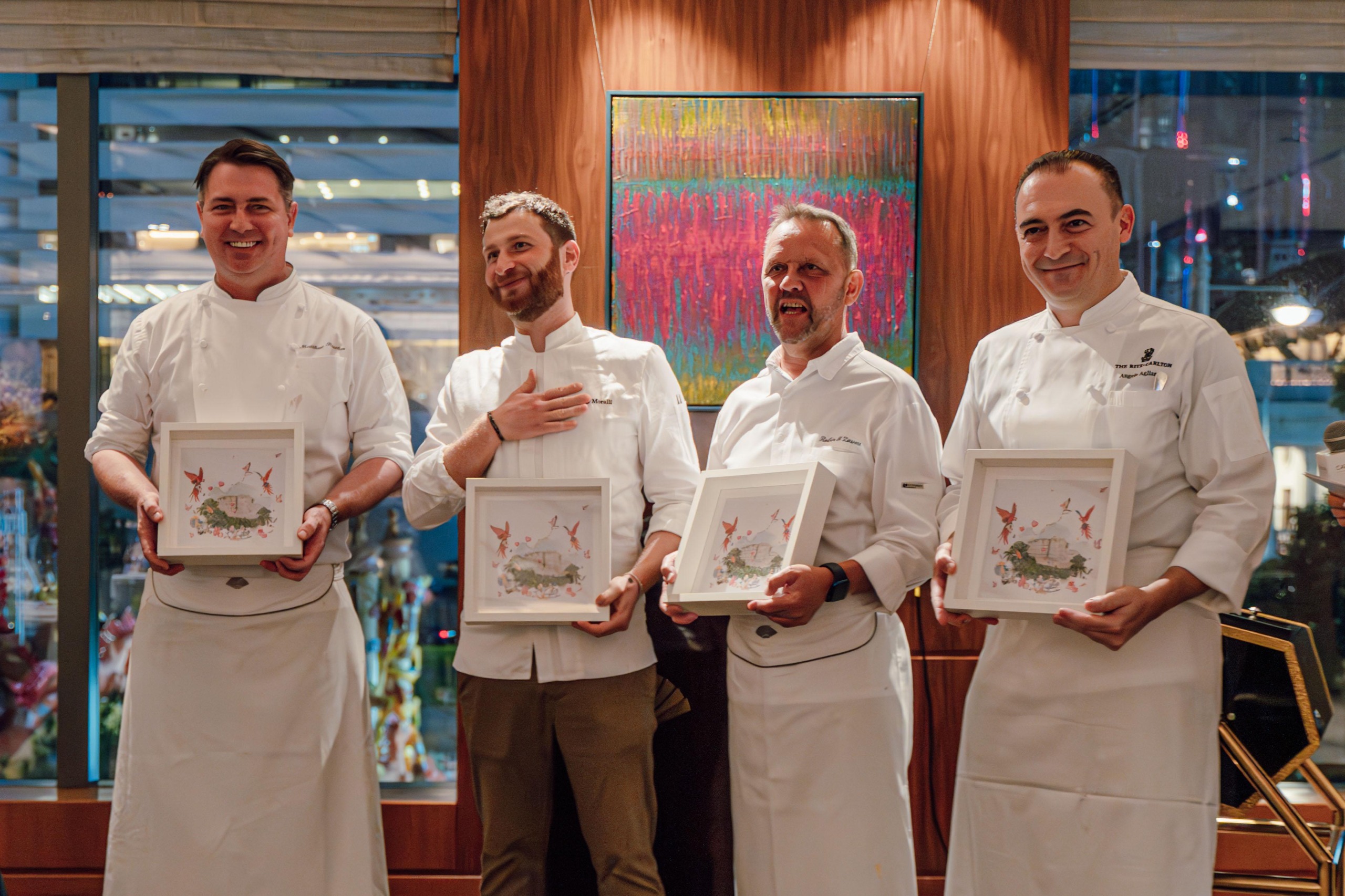 Executive chef, Romeo Morelli (left) led an extraordinary "8 hands" culinary journey, teaming up with award-winning chefs Angelo Aglianò of Tosca di Angelo at The Ritz-Carlton, as well as Robin Zavou and Matthew Reuther of The Mandarin Oriental.