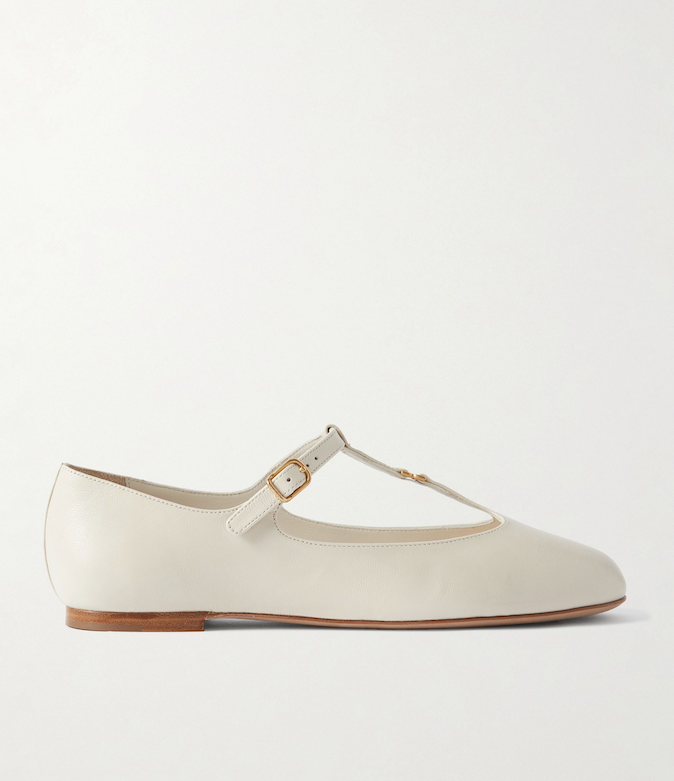 White cotton poplin shirt _ Saint Laurent; Blue ruffled tweed jacket _ Valentino Garavani from Net-A-Porter; Blue asymmetric straight-leg jeans _ Loewe; Light blue FF velvet pouch _ Fendi; White leather ballet flats _ Chloé