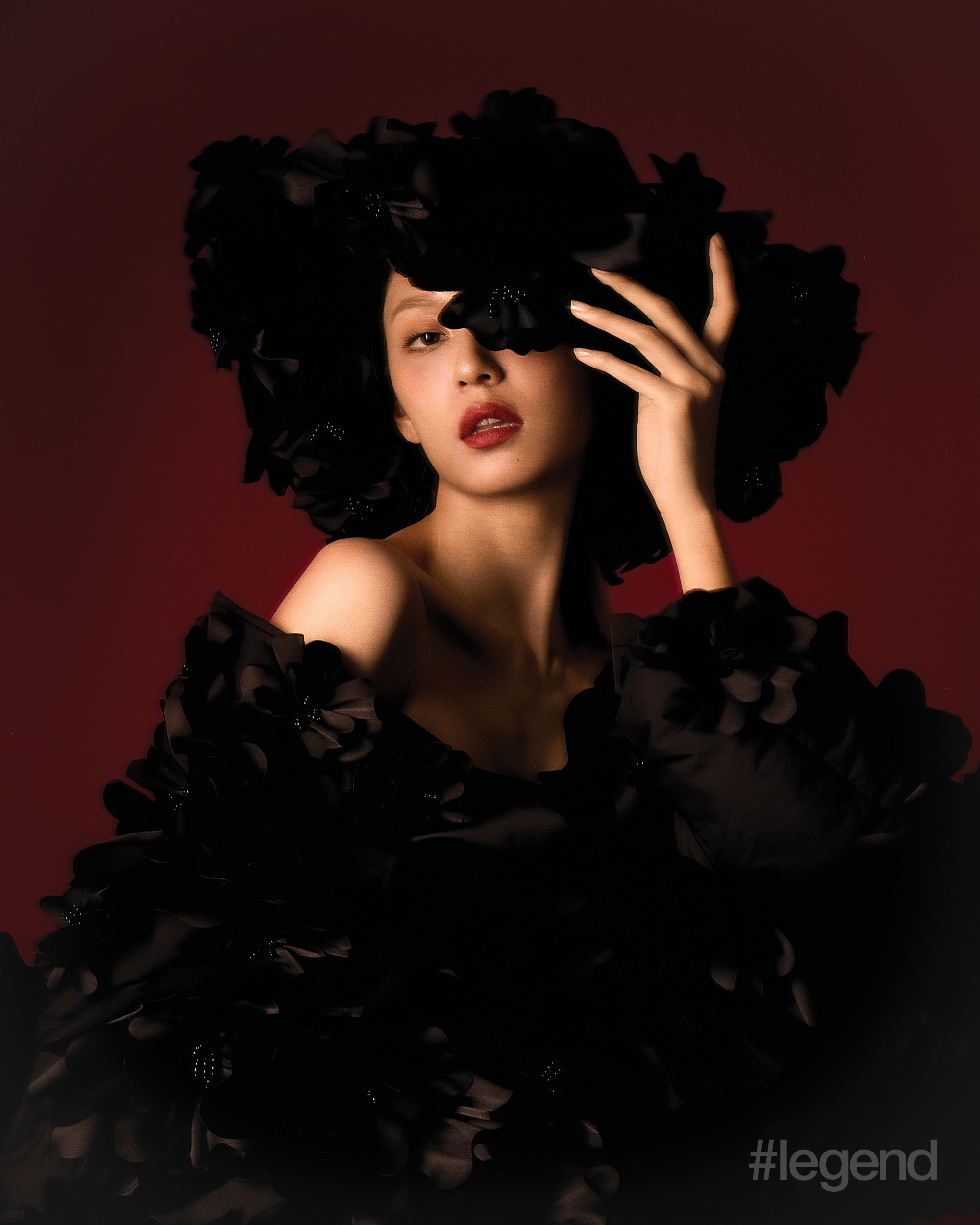 Flower hat, Puffy jacket _ Chen Peng; Black dress _ Giorgio Armani 