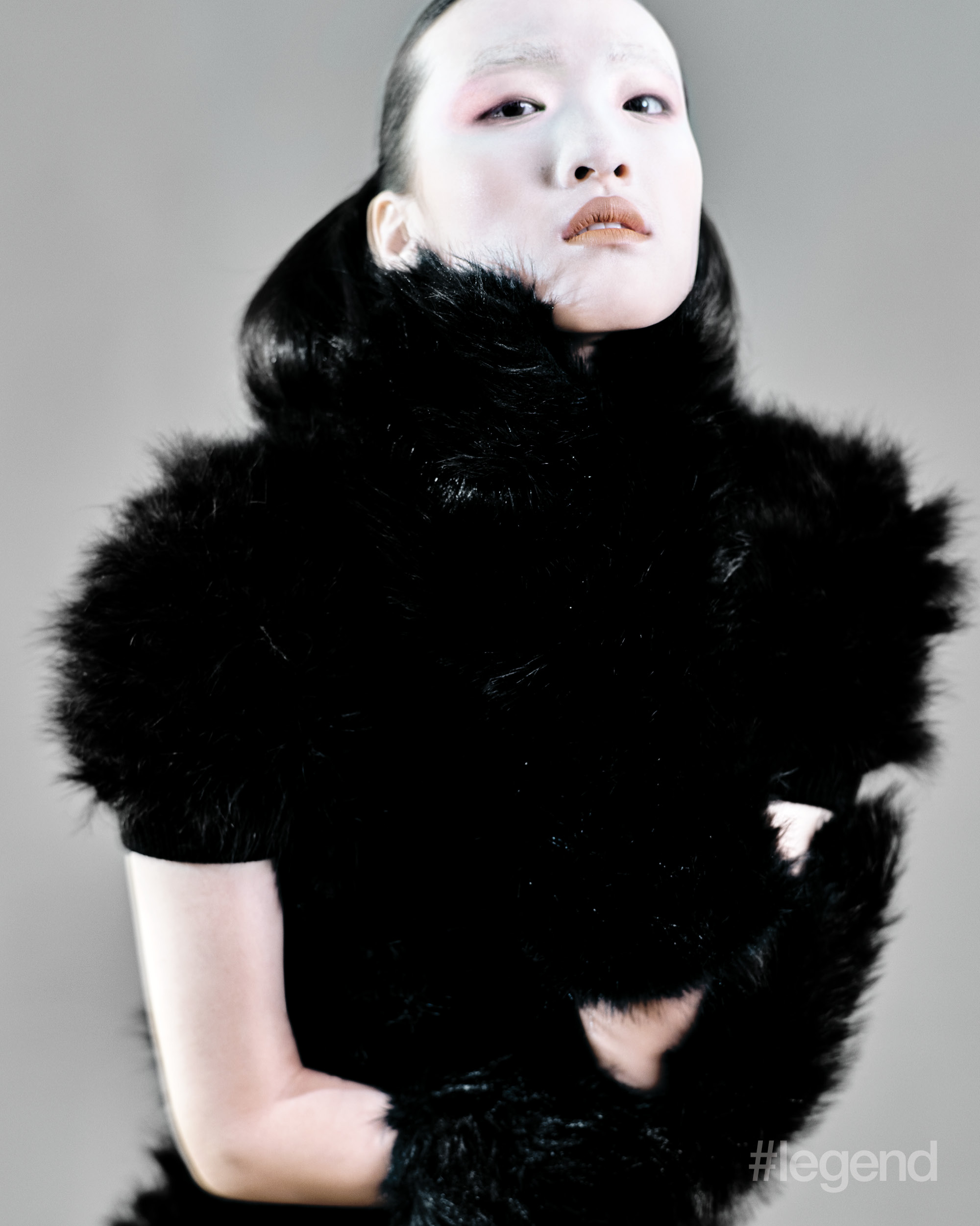 Black fur top and skirt _ Prada; Black gloves _ Simone Rocha