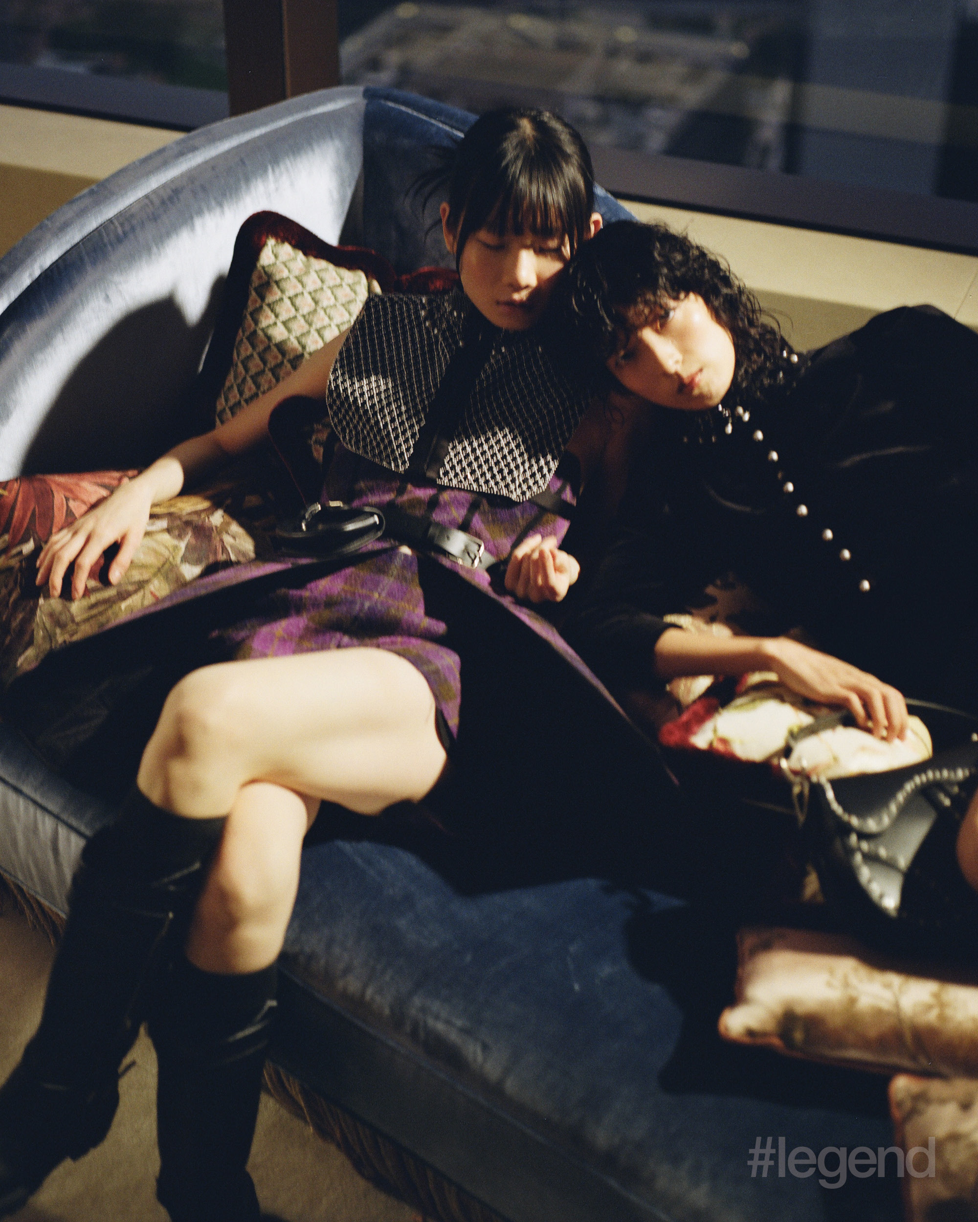 On Cleo (left and opposite): Beaded collar, purple check peplum top and shorts, and black leather belt and boots _ Dior On Lu (right): Black velvet embroidered jacket and bag _ Dior