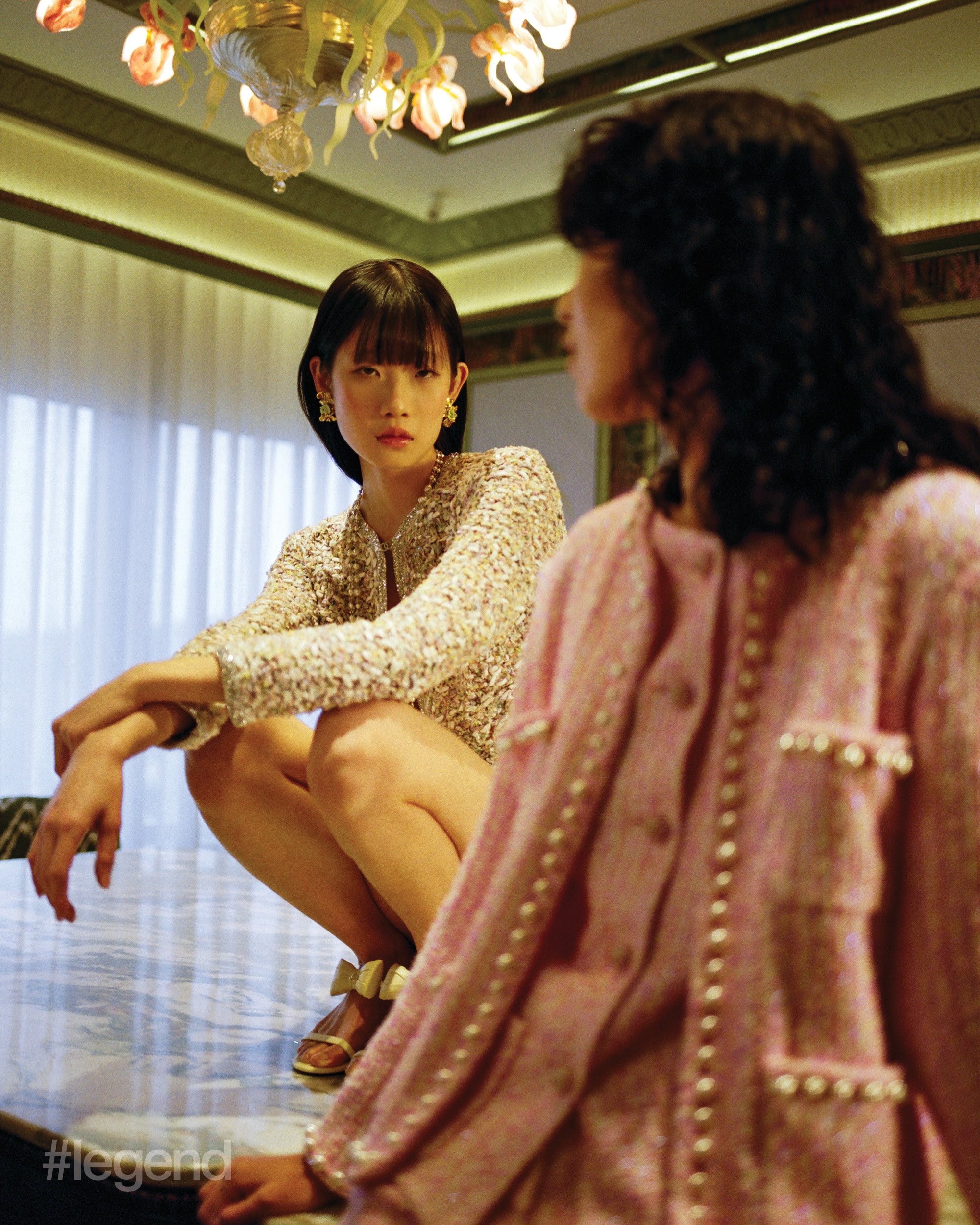On Cleo (left): Beige jacket and skirt, white heels and pearl necklace _ Chanel; Gold earrings _ Vintage Escada from OnceStyle On Lu (right): Pink tweed jacket, top and skirt _ Chanel