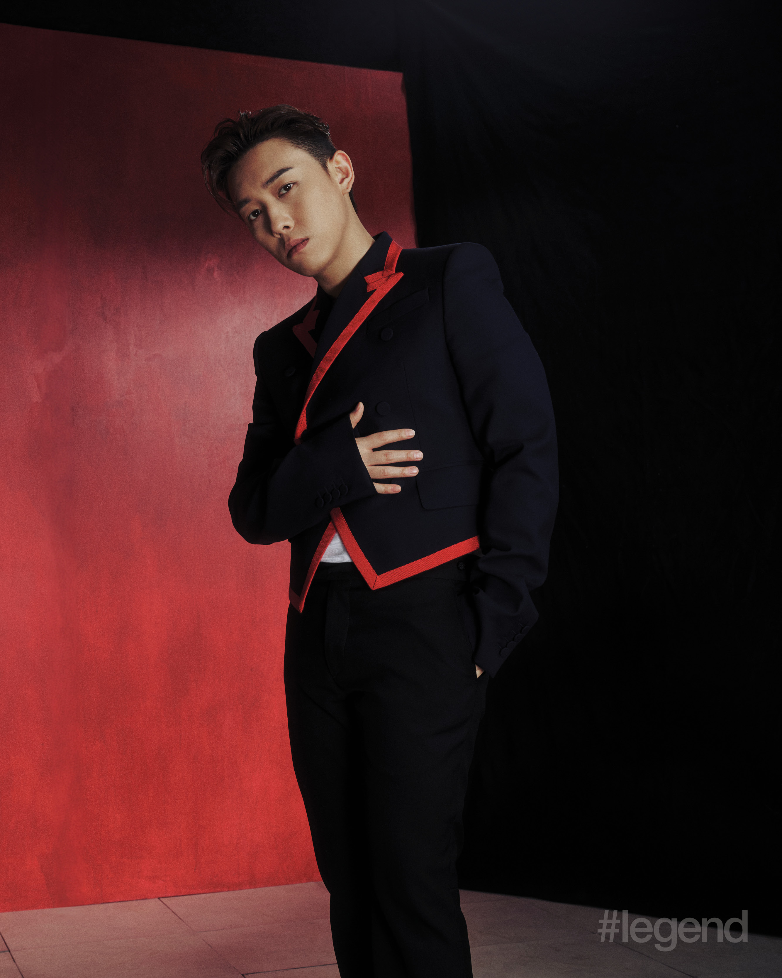 Navy jacket with red trim and flared trousers _ McQueen
