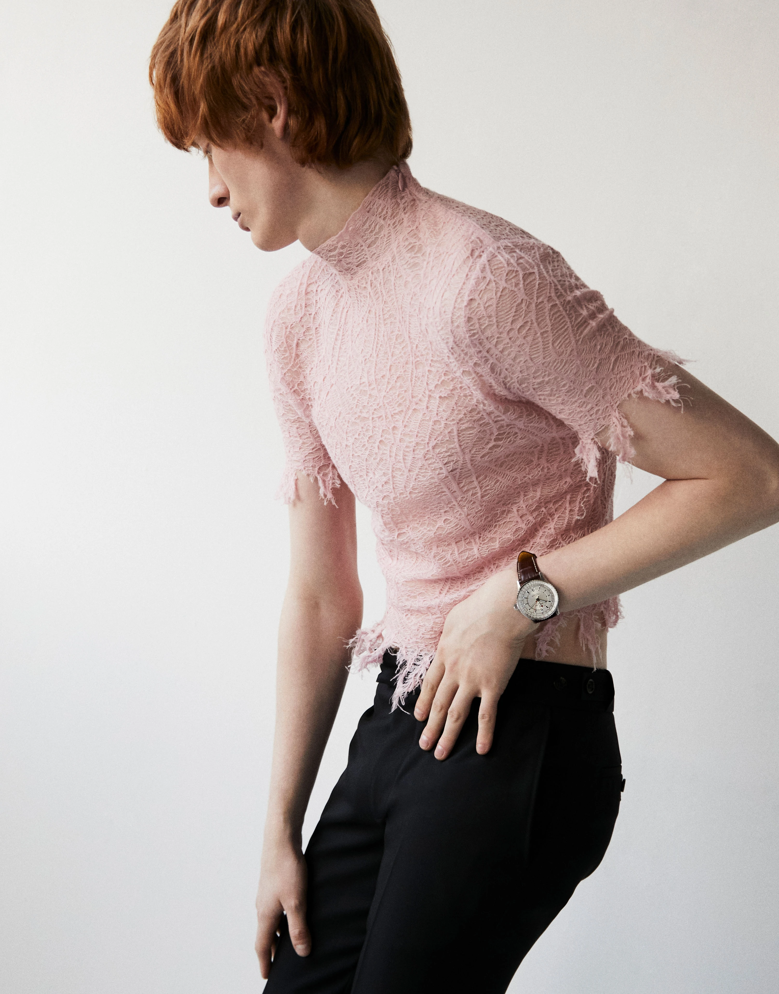 Navitimer Automatic 41 watch _ Breitling, Pink lace top and black trousers _ Alexander McQueen