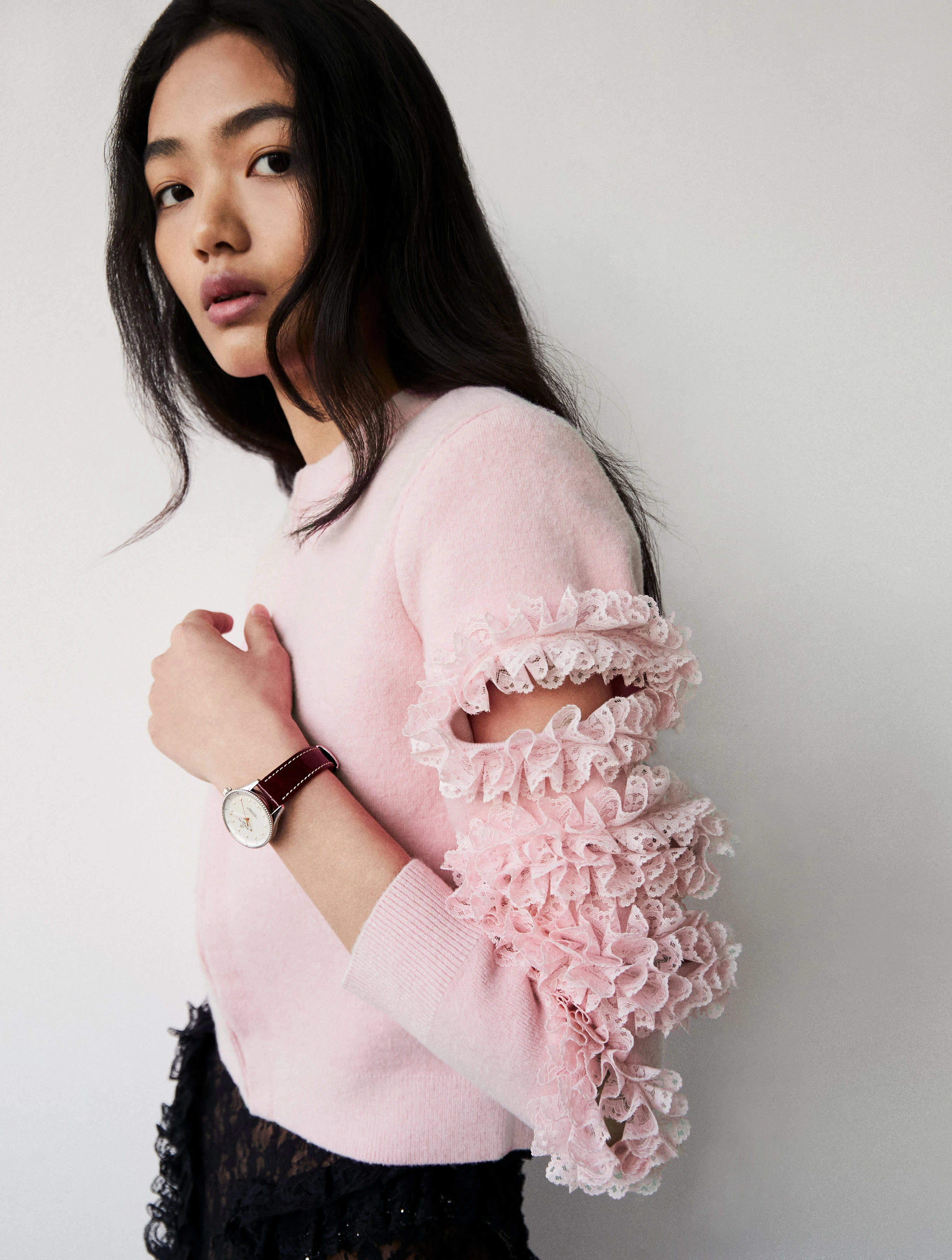 Navitimer 32 watch _ Breitling, Pink sweater _ Self-Portrait, Residency x Christopher Kane