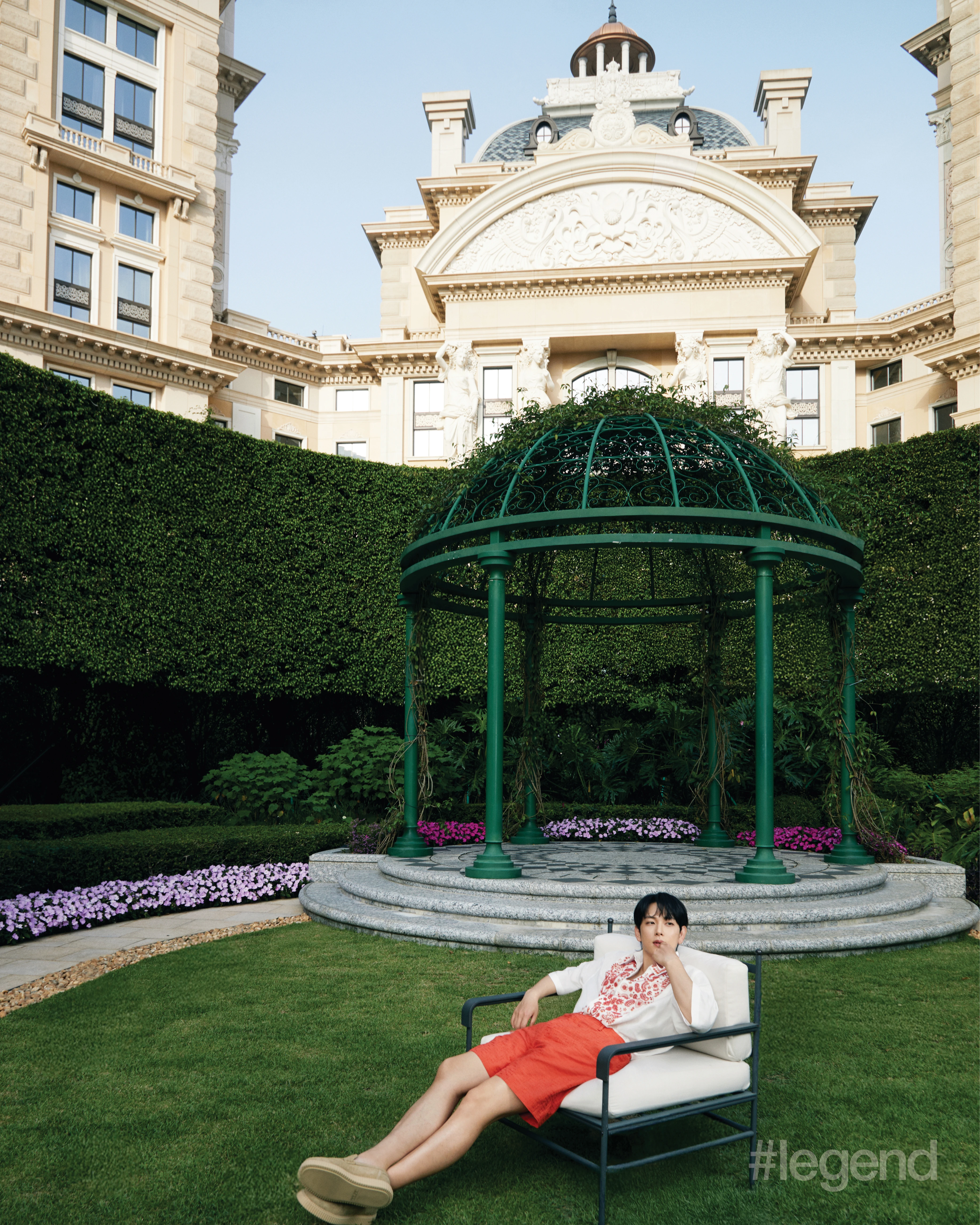 Red and white shirt and red shorts _ Fendi; Beige loafers _ Tod’s; Jardim Secreto, Grand Lisboa Palace Resort Macau