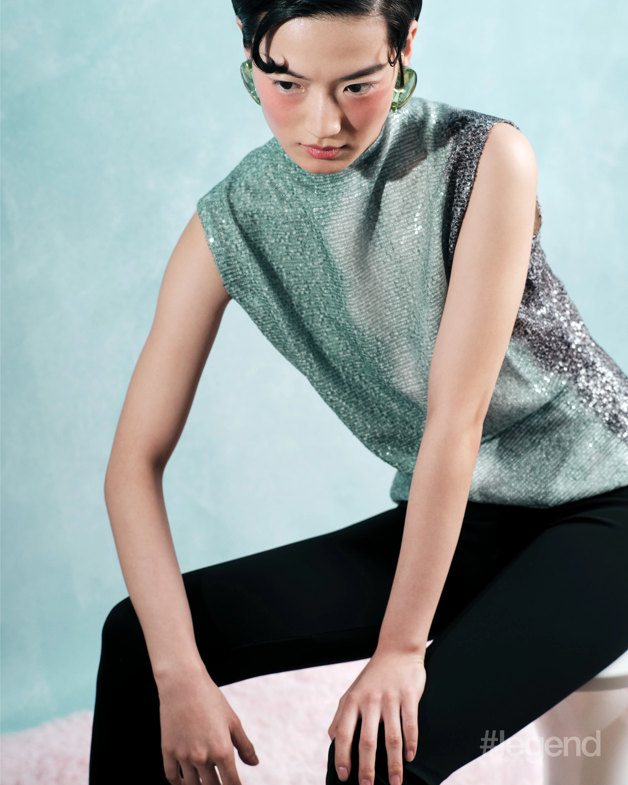 Two-tone sequin top _ 16Arlington; Black leggings _ Balenciaga; Green acrylic earrings _ Monies