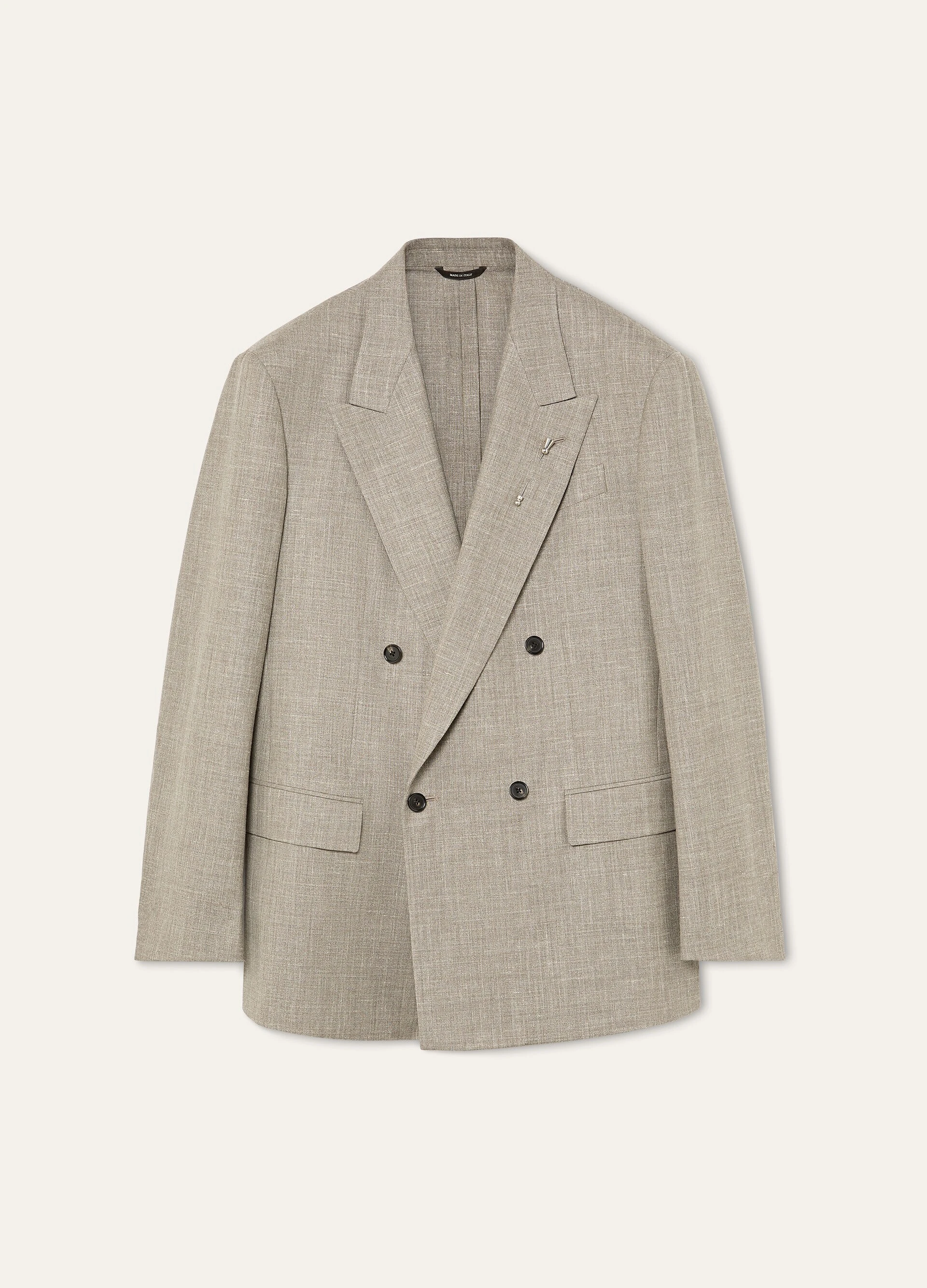 Beige linen and silk jacket _ Loro Piana; Off-white suede loafers _ Brunello Cucinelli; Printed shirt _ Bottega Veneta from Mr Porter; Brown linen shorts _ Zegna from Farfetch